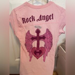 Cancun Hard Rock Cafe 
cute pink baby tee that says “rock angel” on the backs